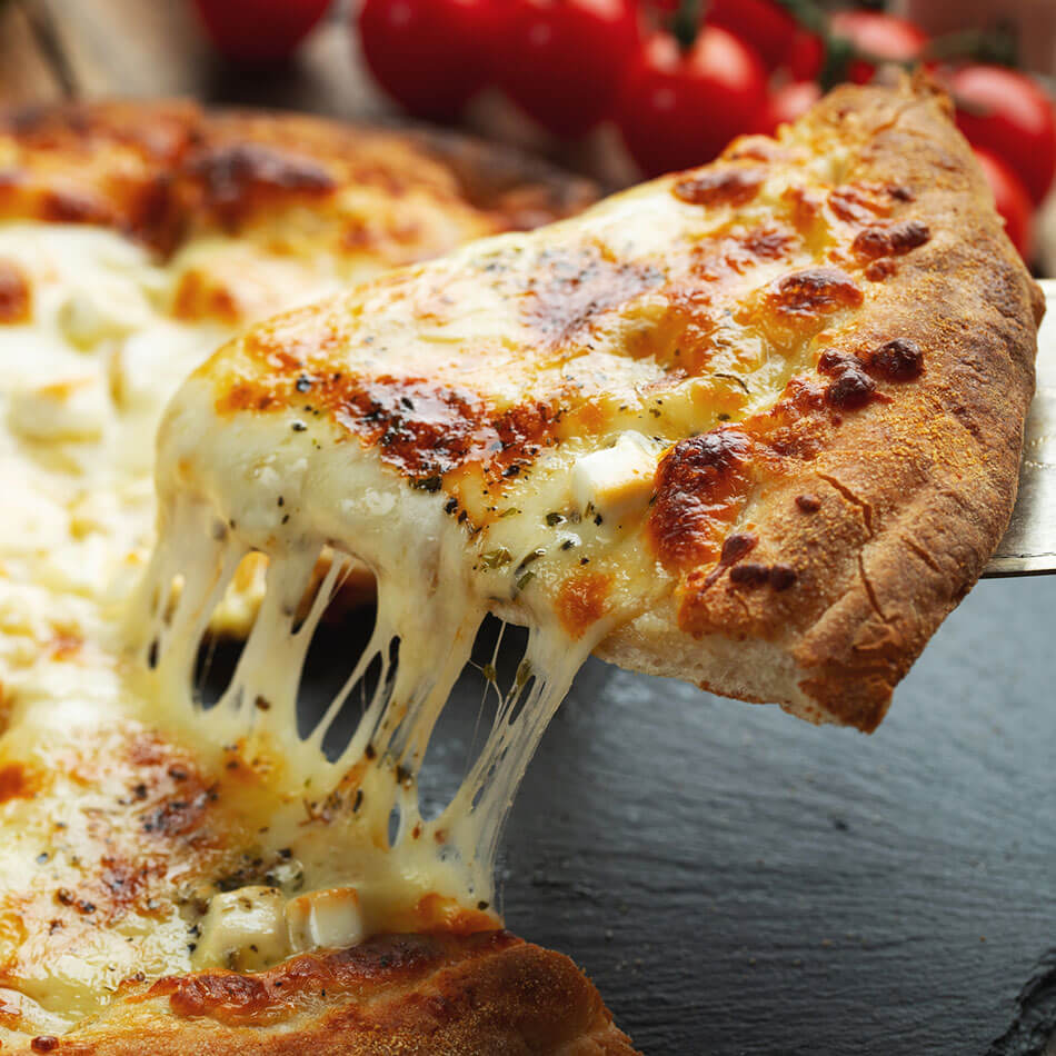 ミルン牧場の自家製チーズ でピザ